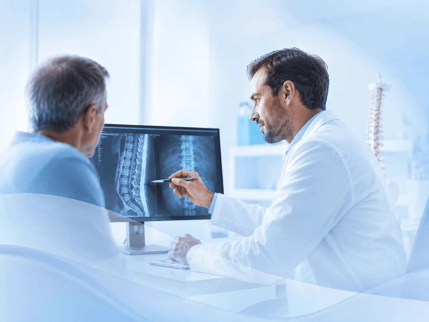 Doctor explaining a spine finding to a patient