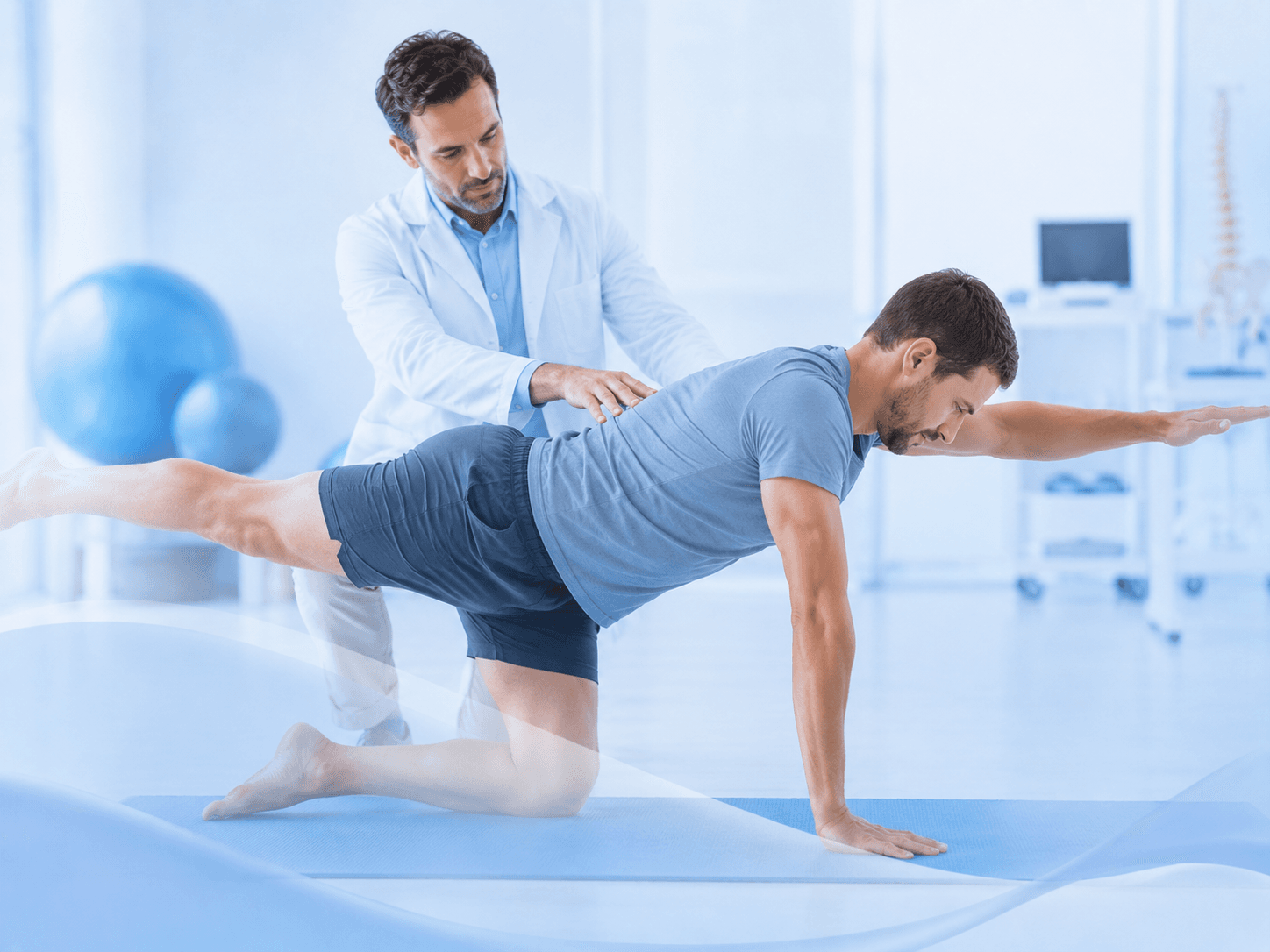 Physiotherapist guiding a patient through a spine stability exercise